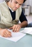 Man Writing Letter
